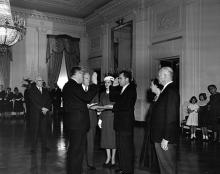 January 20, 1957 - Vice President Richard Nixon being sworn in by Senator William Knowland during the private ceremony held in the East Room of the White House