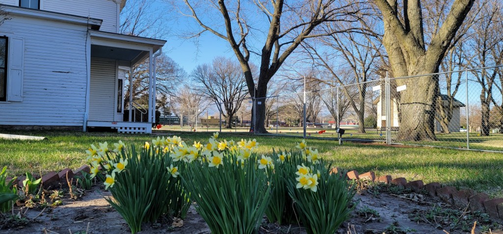 Image taken inside the fence around the boyhood home preservation project showing home exterior