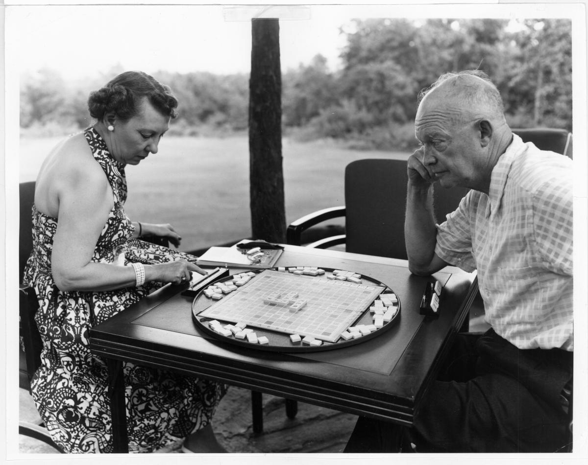 Mamie and Ike play a board game at Camp David.