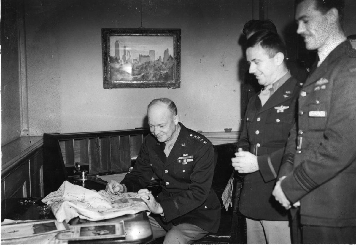 General Dwight D. Eisenhower meets with several of his military aides at 20 Grosvenor Square in London. Spring, 1944 [68-638]