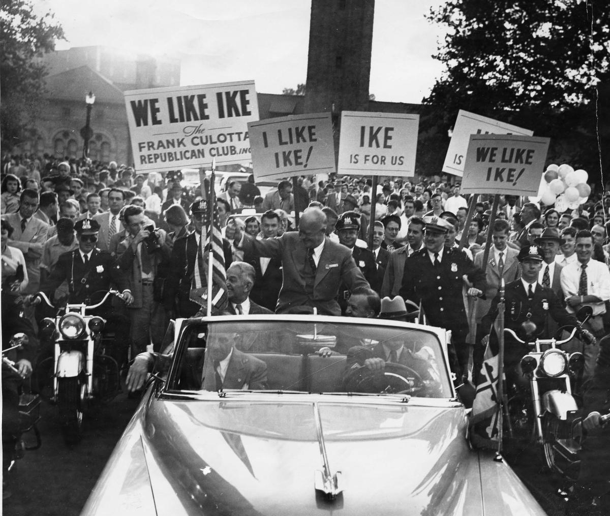 Photo of Dwight Eisenhower riding in an open car during a 1952 campaign rally in Maryland.
