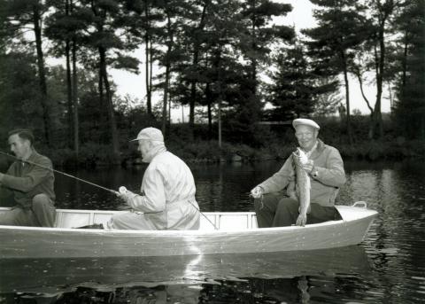 Dwight D. Eisenhower (right), W. Alton Jones (center), and George Wheatley (left) fishing near West Greenwich, Rhode Island. Eisenhower, George Allen, William E. Robinson, James Hagerty, and Howard Snyder were guests of W. Alton Jones at his Hianolands Farms Estate. September 19, 1958.