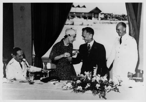 Luncheon given in honor of Dwight Eisenhower by Philippine President Manuel Quezon. L to R: General Douglas MacArthur, Mamie Eisenhower, Manuel Quezon, and Dwight D. Eisenhower, Manila, Philippines. 1939 [64-484]