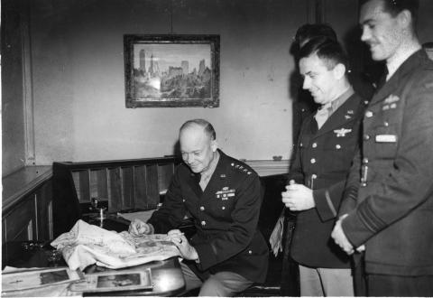 General Dwight D. Eisenhower meets with several of his military aides at 20 Grosvenor Square in London. Spring, 1944 [68-638]