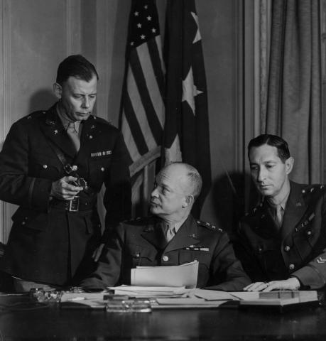 General Eisenhower, Major General Mark Clark, and General Walter Bedell Smith during a conference in London. September 29, 1942 [71-324]