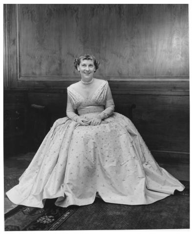 Mrs. Mamie Eisenhower poses in her Inaugural Ball gown, New York City,  January 14, 1953. New York Herald Tribune photo. [72-11-5]