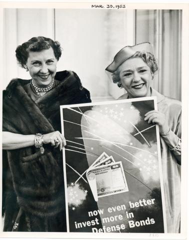 Mamie D. Eisenhower meets with Mary Pickford at the White House for the purpose of starting the nation wide campaign to increase the sale of United States Defense Bonds. March 31, 1953 [72-168-2]