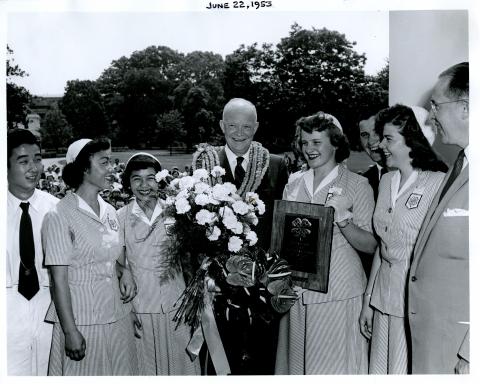 President Eisenhower receives members of the National 4-H Club Camp in the White House Rose Garden. June 22, 1953 [72-344-3]
