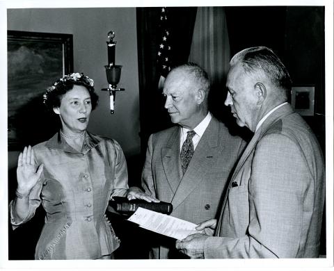 Dwight D. Eisenhower witnesses Frank K. Sanderson swearing in Mrs. Katherine G. Howard, as Deputy Administrator of the Federal Civil Defense Administration. June 29, 1953 [72-357-1]