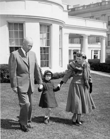 Dwight and Mamie Eisenhower with granddaughter Susan Eisenhower, April 12, 1957.