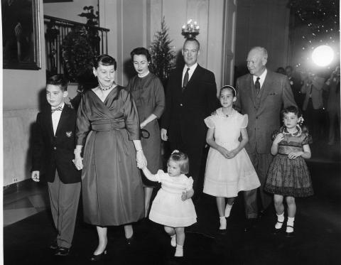 Dwight and Mamie Eisenhower, John and Barbara Eisenhower, and their children, Christmas, 1957.