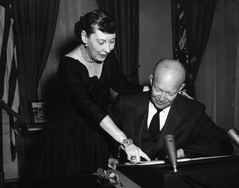 President and Mrs. Eisenhower talk prior to the President's radio and television address to the nation announcing his willingness to run for a second term.