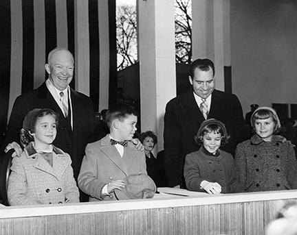January 21, 1957 - Dwight D. Eisenhower on the reviewing stand with his grandchildren; Richard Nixon and his daughters. [72-2063-85]
