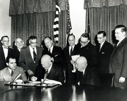 January 3, 1959 - President Dwight D. Eisenhower signs the Alaska Proclamation admitting Alaska as the 49th state. [72-2933-1]