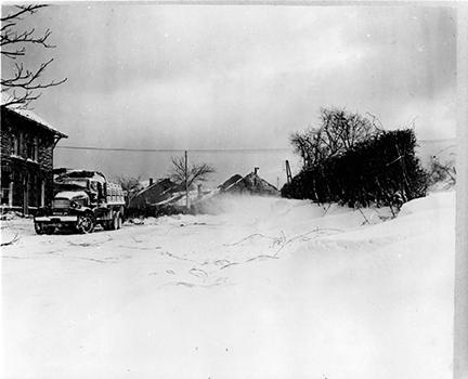 Ardennes-Battle of the Bulge. January 19, 1945 - The passing of a blizzard in Wanne, Belgium.