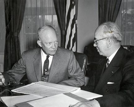 March 30,1954 - Dwight D. Eisenhower receives a report from Lewis L. Strauss, Chairman of the Atomic Energy Commission, on the hydrogen bomb tests in the Pacific. [72-767-1]