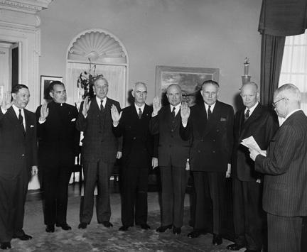 January 3, 1958 - Dwight D. Eisenhower witnesses the swearing in ceremony for members of the Civil Rights Commission [72-2571-2]