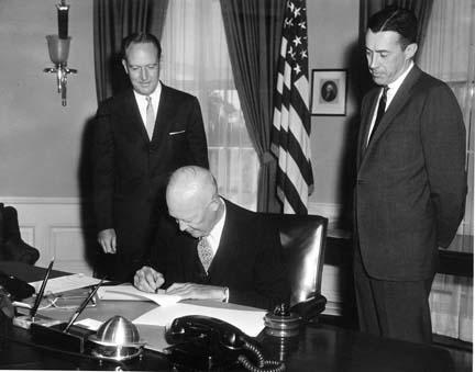 May 6, 1960 - William Rogers and Lawrence Walsh witness Dwight D. Eisenhower signing the Civil Rights Bill [72-3417-1]