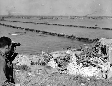 June 23, 1944 - Mulberry and Gooseberry projects, vast landing platforms extending 1,000 yards into the channel from Omaha Beach, proved instrumental in the transportation of huge quantities of material from landing craft