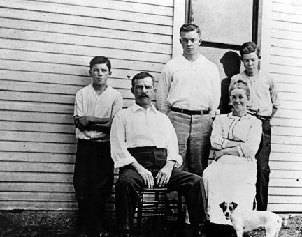 1910 - DDE with his parents and two brothers. L to R: Milton, David, DDE, Ida, and Earl (and dog Flip)
