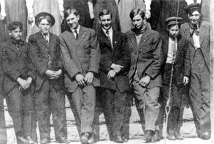 1909 - Cropped from a photo of the entire student body in front of Abilene High School. Dwight D. Eisenhower is third from right