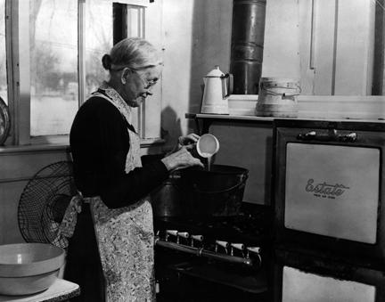 Ida Eisenhower cooking in her kitchen in the Eisenhower home