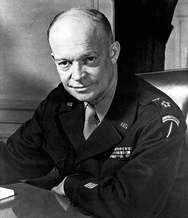 General Dwight D. Eisenhower at his desk. [77-18-1442]
