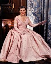 Mamie poses in her pink inaugural gown for a portrait by photographer Frank Turgeon.