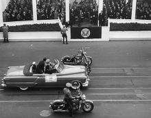 January 20, 1953 - The Inaugural Parade pauses with Kansas Governor Edward F. Arn with two motorcycle escorts as one of the escorts goes over to shake hands with DDE during the Inaugural Parade - 