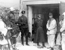 Ardennes-Battle of the Bulge. January 23, 1945 - Nazi officers were among the first prisoners to be taken by the 7th Armored Division in their drive on St. Vith, Belgium. Snow covers the ground.