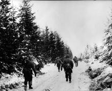 Ardennes-Battle of the Bulge. January 15, 1945 - Some of the 83rd Division moving toward the front in the Houffalize sector, Belgium.