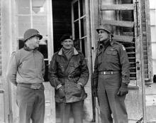 Ardennes-Battle of the Bulge. December 26, 1944 - L to R: Major General J. Lawton Collins, Field Marshal Bernard Montgomery and Major General Matthew Ridgway after a conference in Mean, Belgium.