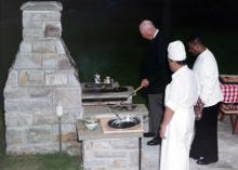 August 14, 1960 - Dwight D. Eisenhower cooking for friends at Camp David