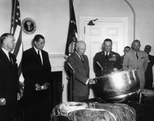 August 15, 1960 - Dwight D. Eisenhower views the capsule which was retrieved from Discoverer XIII, a CORONA satellite. [72-3525-2]