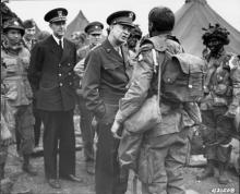 June 5, 1944 - DDE speaks with paratroopers of the 101st Airborne Division just before they board their planes to participate in the first assault of the Normandy invasion