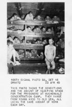 April 23, 1945 - Men in the prisoners' barracks at Buchenwald concentration camp. 