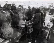 December 4, 1952 - Dwight D. Eisenhower passes through the "chow" line of the 15th Infantry Regiment, 3rd US Infantry Division, Korea [77-18-897]